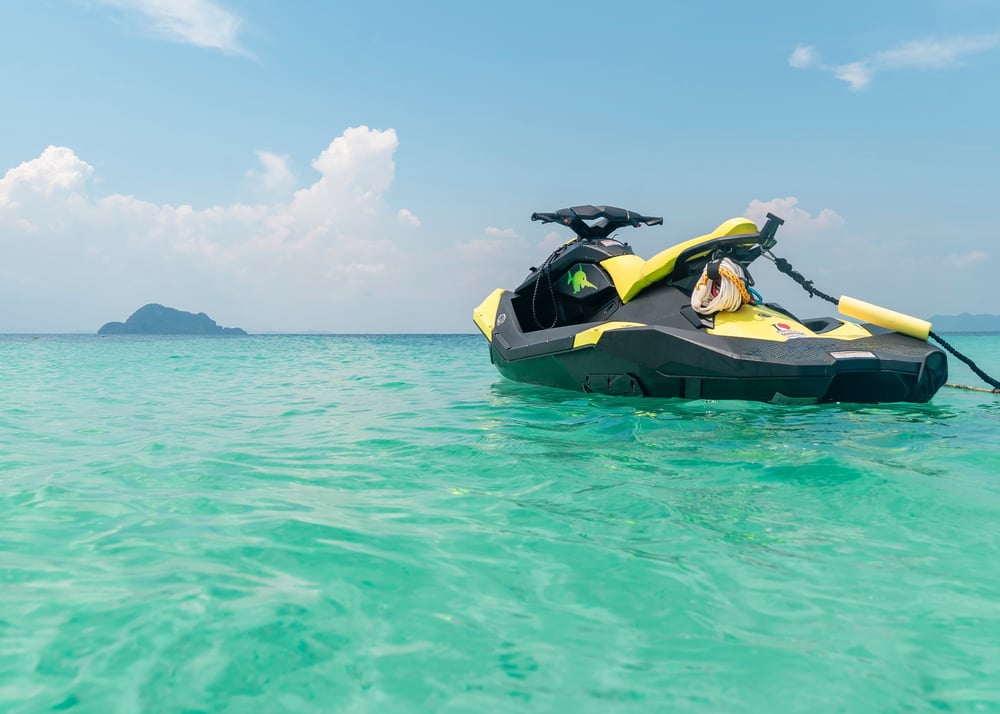 jet ski financing and boat loan financing are available at america's credit union image of jet ski in water