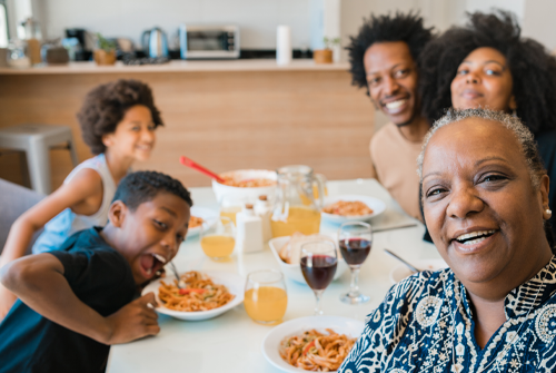 trustage disability insurance at america's credit union has you covered family at dinner table