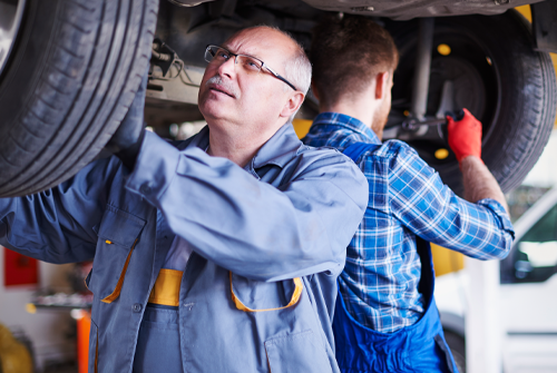 extended car warranty protection at america's credit union is valuable men working on car repairs