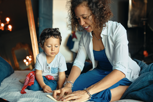 trustage involuntary unemployment insurance at america's credit union has you covered mom helping son make paper airplane