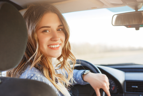 gap insurance at america's credit union has you covered young woman in drivers seat